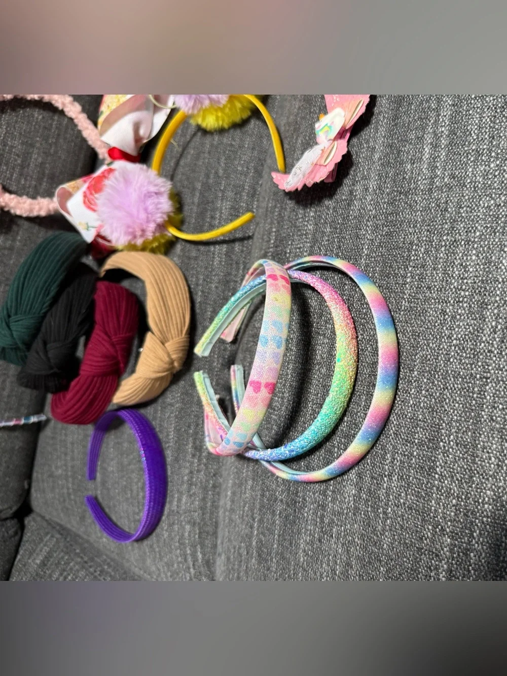 Bundle of girls hair accessories and a small little girls purse.